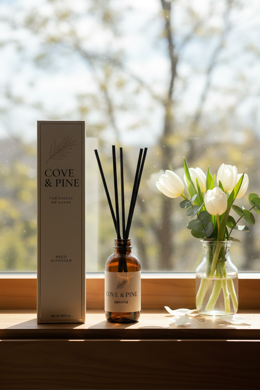 Paloma Reed Diffuser on windowsill with spring flowers